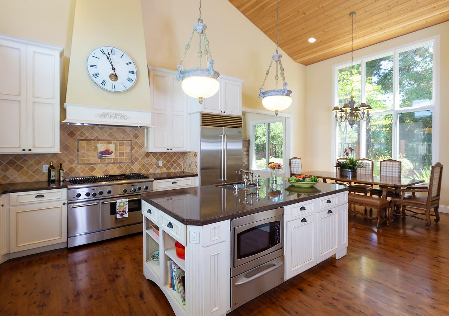 595 Day Valley Road Aptos, CA 95003 - Photo 12 of 37 a kitchen with stainless steel appliances granite countertop a stove and a large window