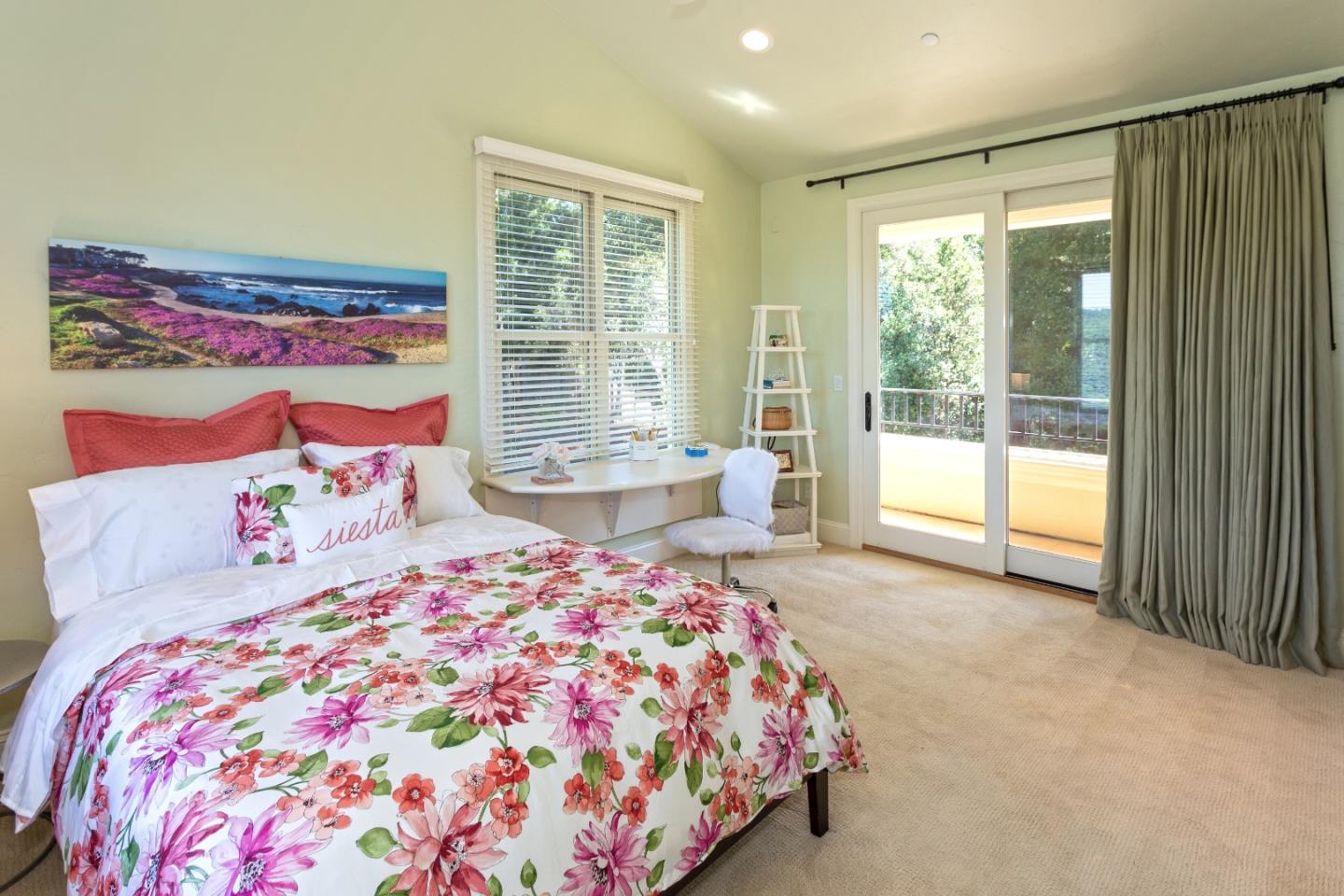 595 Day Valley Road Aptos, CA 95003 - Photo 14 of 37 a bedroom with a bed and a large window