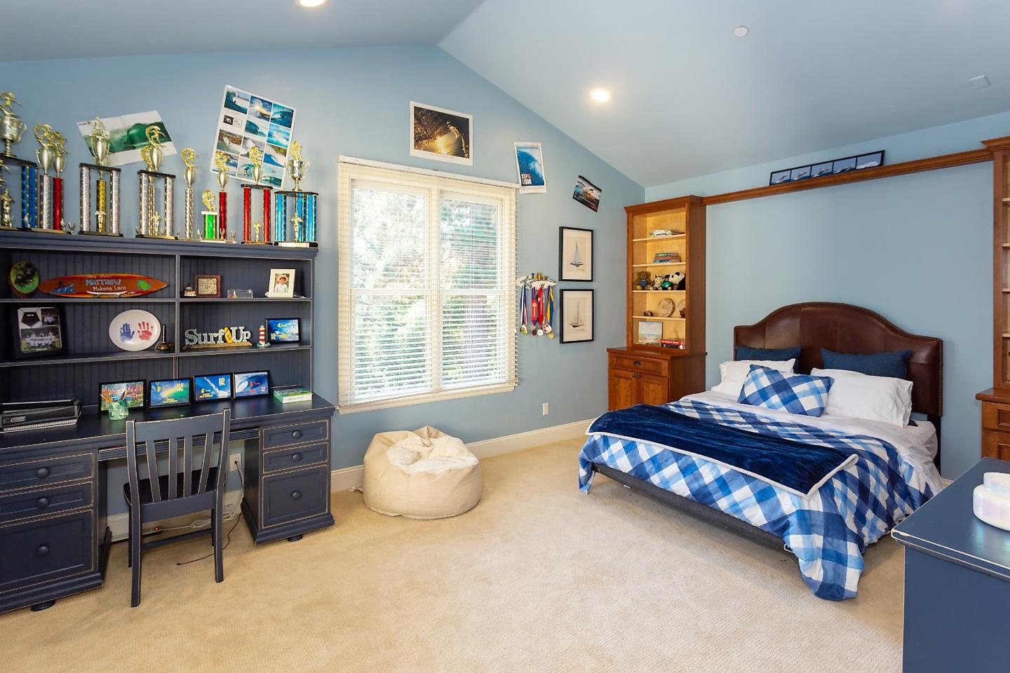 595 Day Valley Road Aptos, CA 95003 - Photo 16 of 37 a bedroom with bed and a book shelf