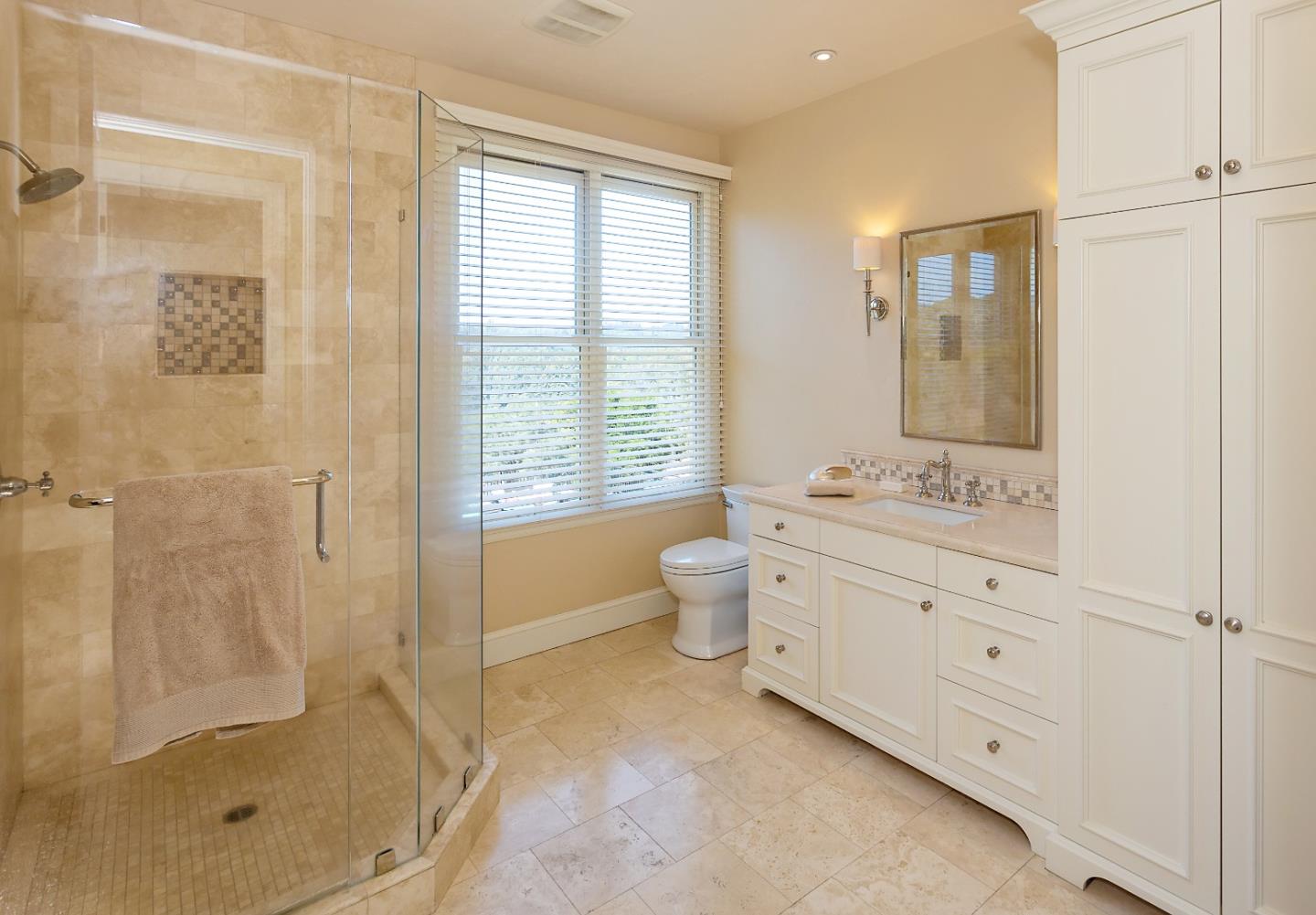 595 Day Valley Road Aptos, CA 95003 - Photo 20 of 37 a bathroom with a granite countertop sink a toilet and shower