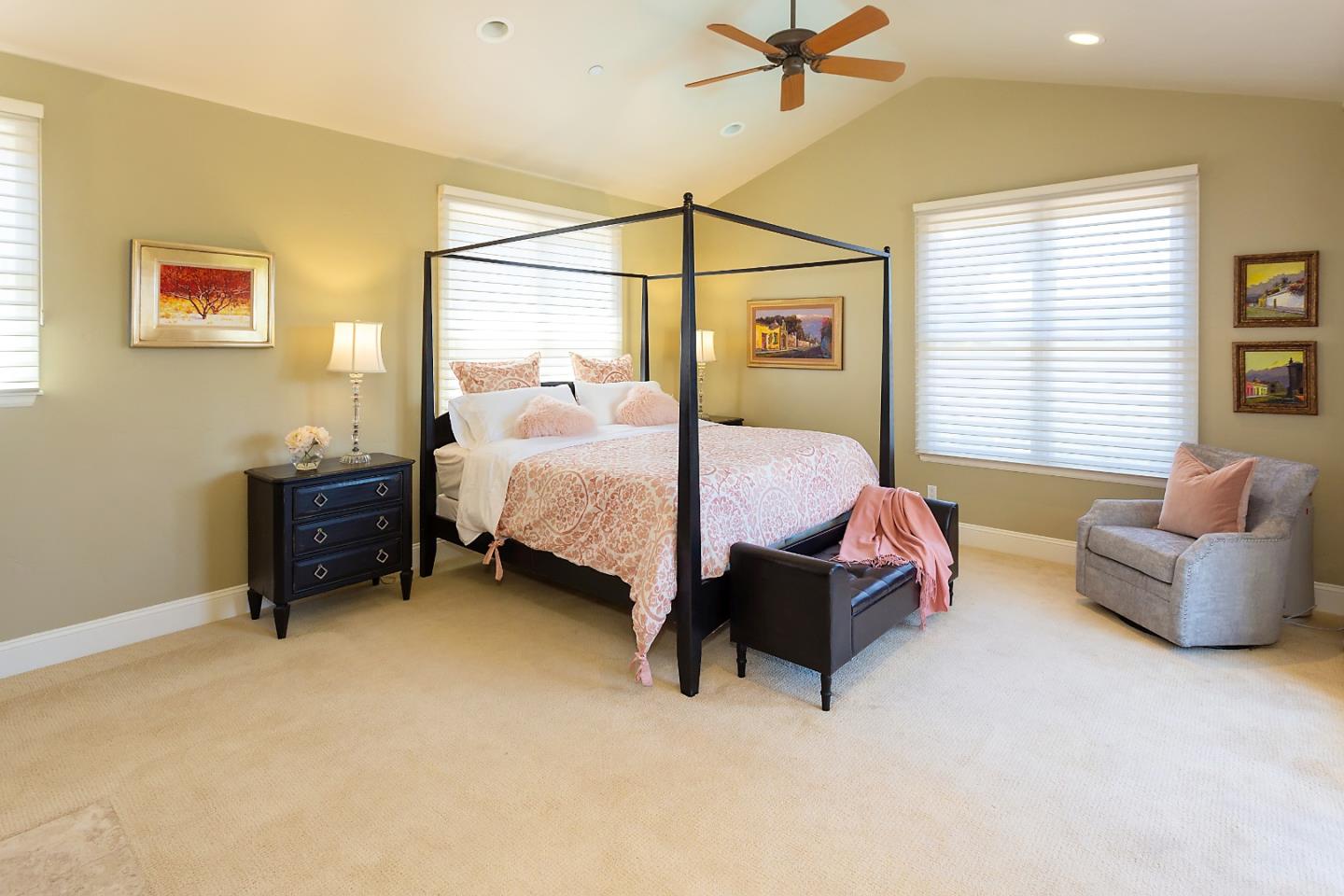 595 Day Valley Road Aptos, CA 95003 - Photo 21 of 37 a bedroom with a bed and a couch