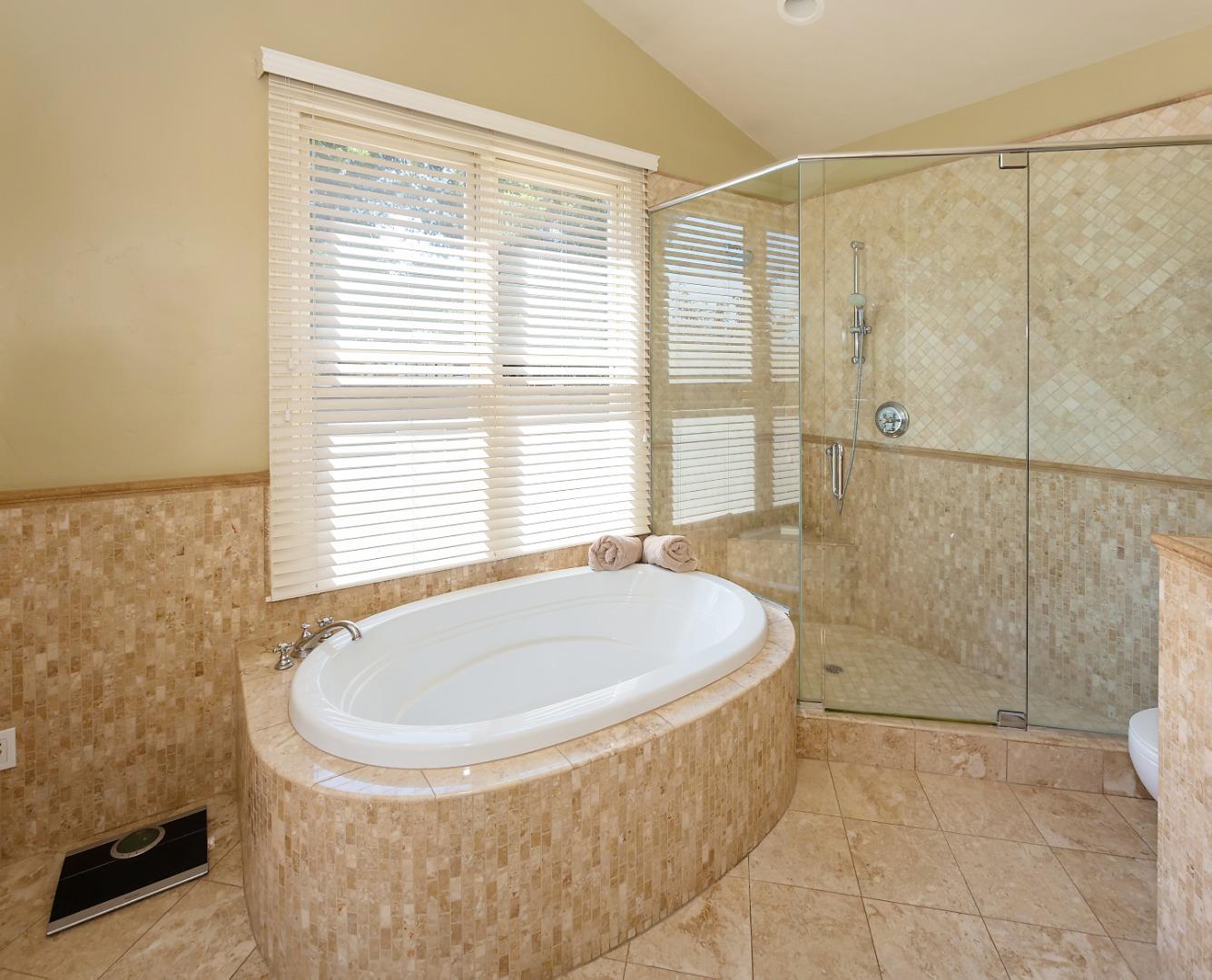 595 Day Valley Road Aptos, CA 95003 - Photo 22 of 37 a bathroom with a bathtub and shower