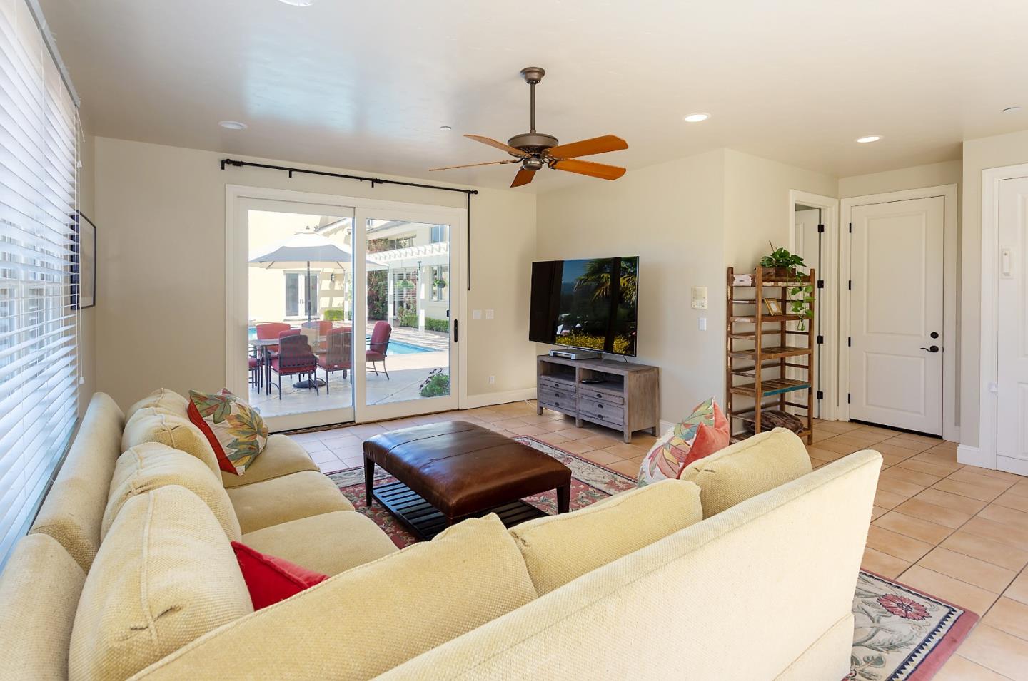 595 Day Valley Road Aptos, CA 95003 - Photo 24 of 37 a living room with furniture a flat screen tv and a large window