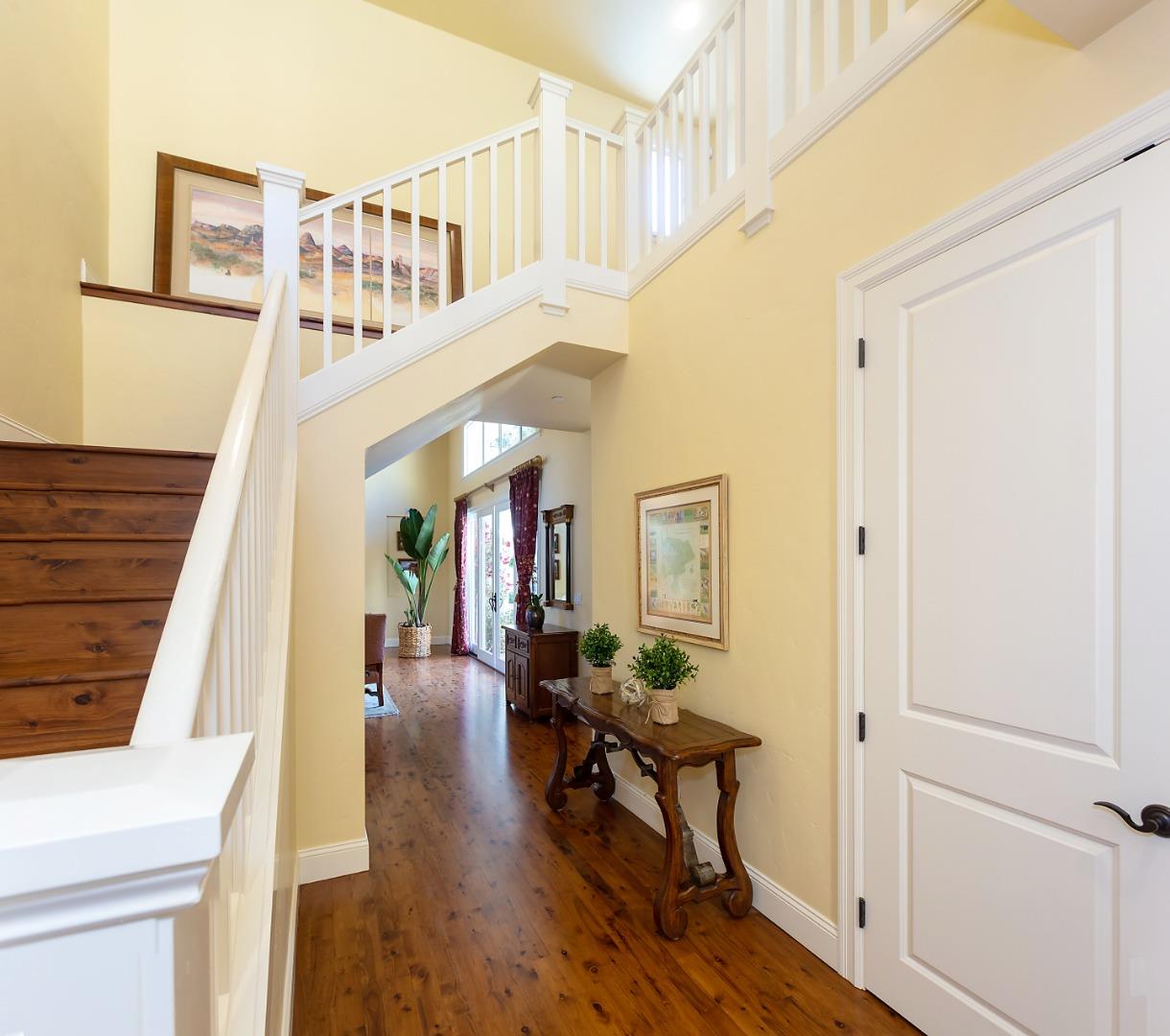 595 Day Valley Road Aptos, CA 95003 - Photo 27 of 37 a view of a hallway with wooden floor and staircase