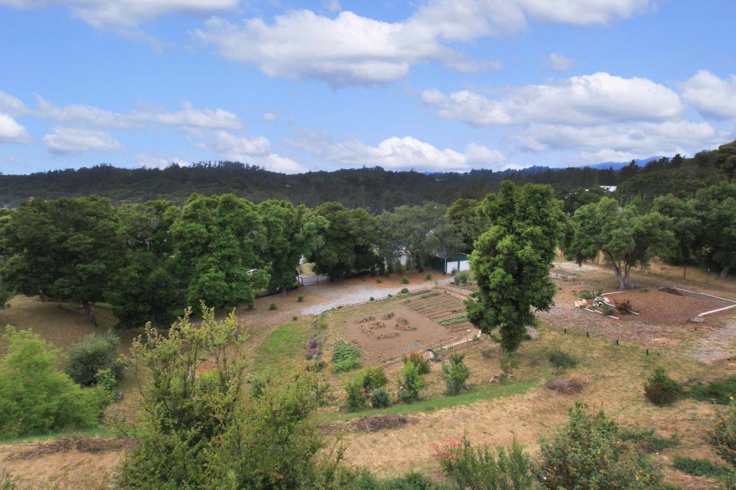 595 Day Valley Road Aptos, CA 95003 - Photo 32 of 37 a view of a lake with mountains in the background