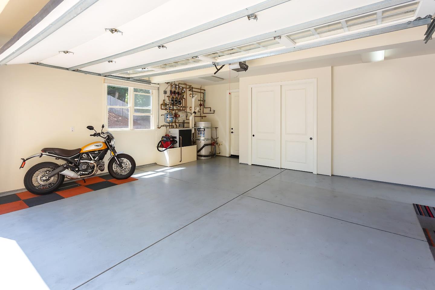 595 Day Valley Road Aptos, CA 95003 - Photo 34 of 37 a view of a garage with parked cars