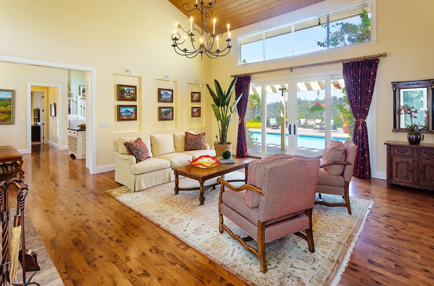 595 Day Valley Road Aptos, CA 95003 - Photo 9 of 37 a living room with furniture a chandelier and a large window