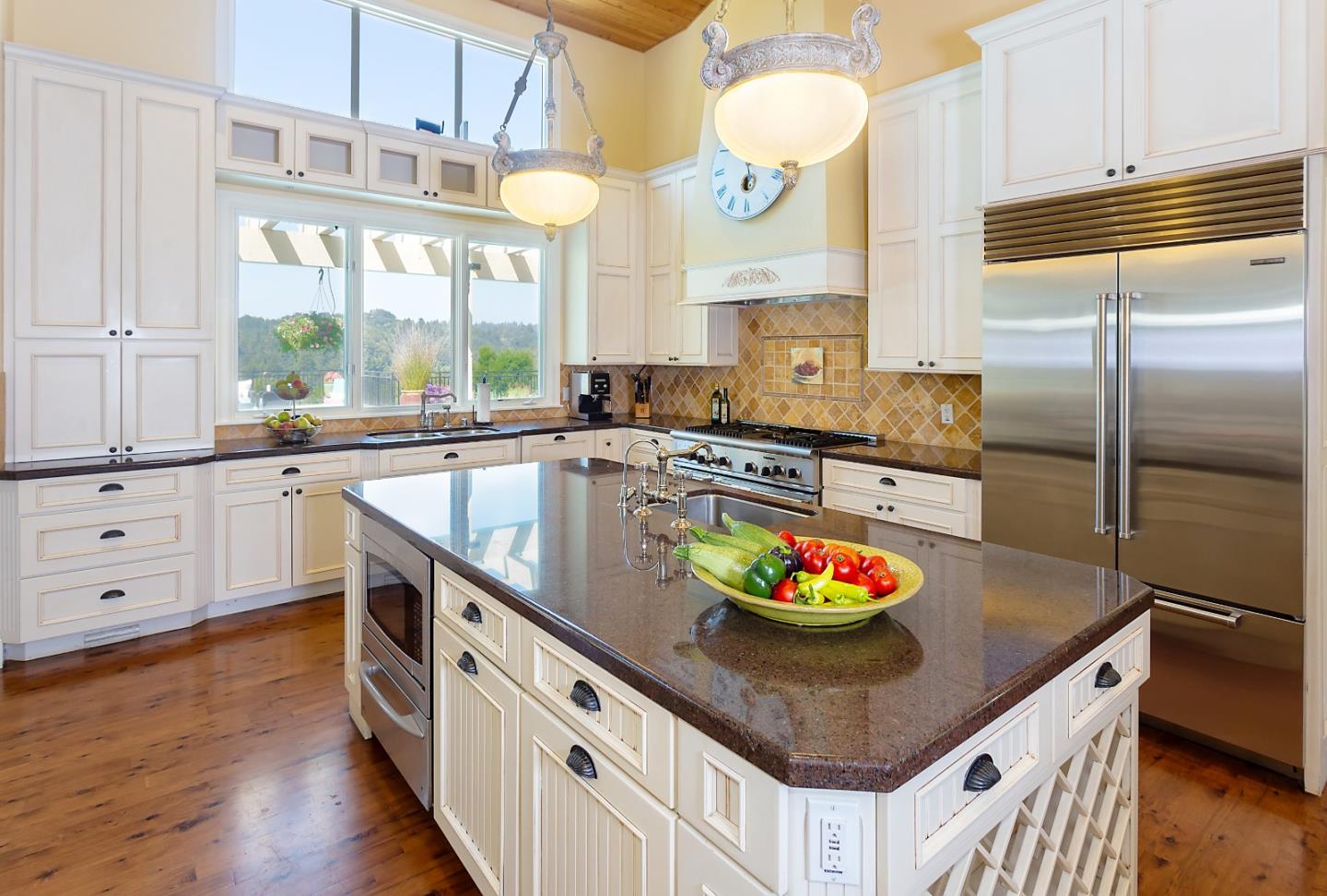 595 Day Valley Road Aptos, CA 95003 - Photo 10 of 37 a kitchen with stainless steel appliances granite countertop a sink a stove and a refrigerator