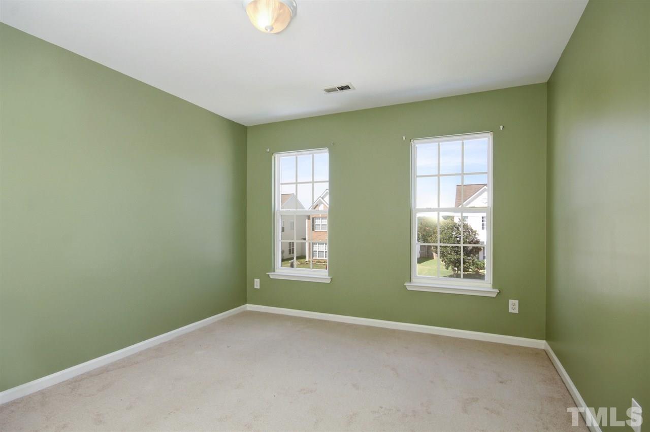 7444 Lagrange Drive Raleigh, NC 27613 - Photo 22 of 30 an empty room with windows