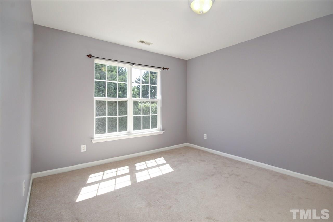 7444 Lagrange Drive Raleigh, NC 27613 - Photo 25 of 30 an empty room with a window