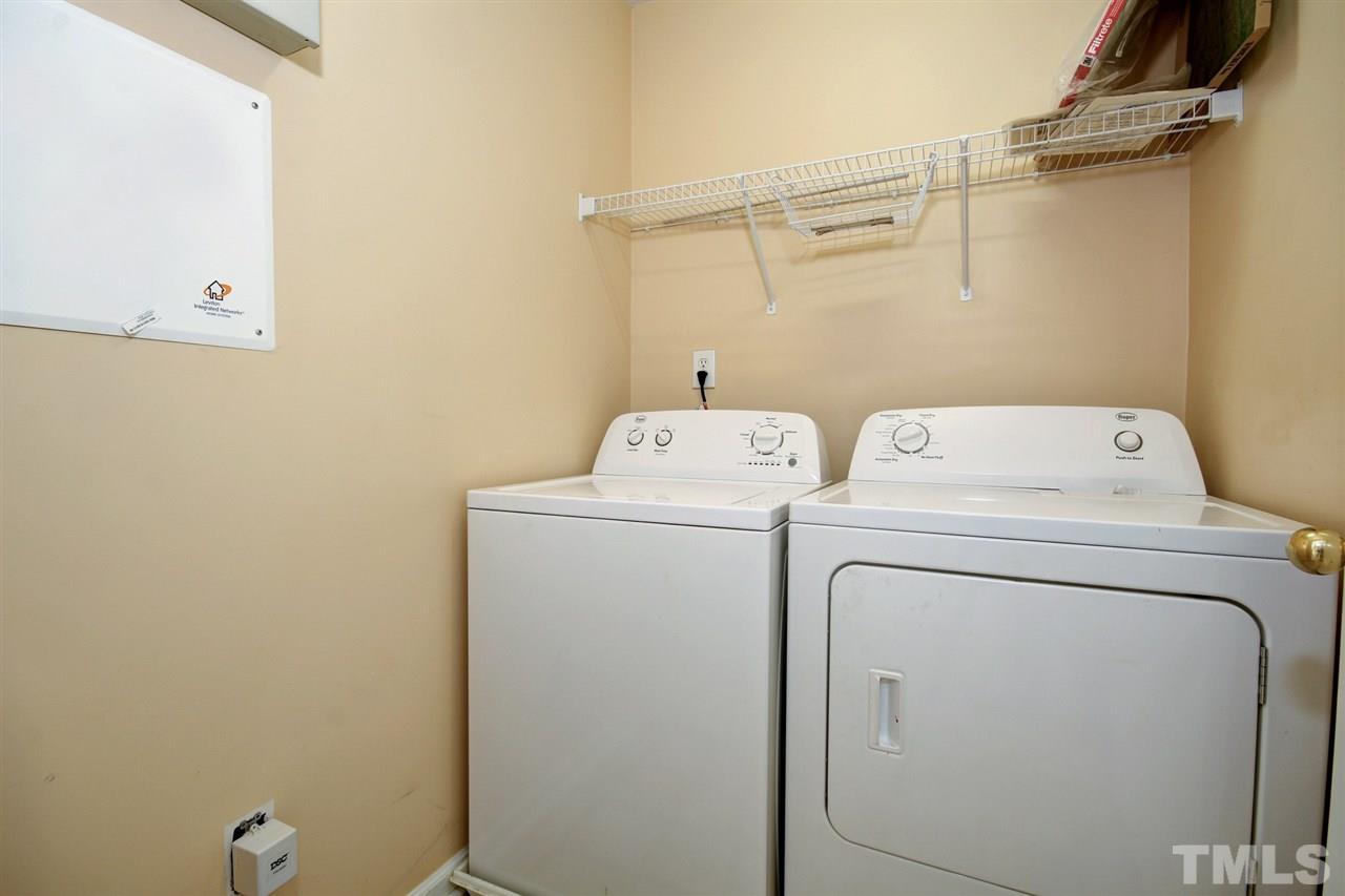 7444 Lagrange Drive Raleigh, NC 27613 - Photo 27 of 30 a utility room with dryer and washer