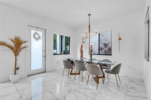 a view of a livingroom with furniture and window