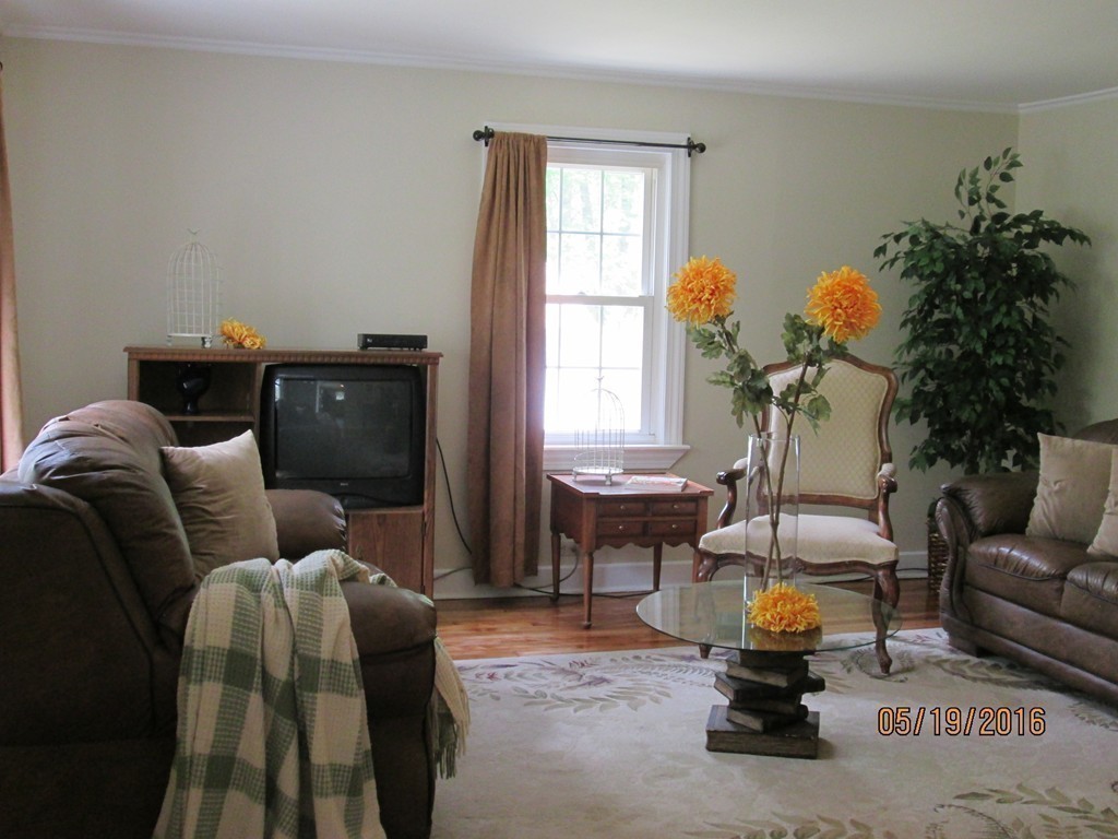 198 Ball Hill Road Princeton, MA 01541 - Photo 8 of 26 a living room with furniture flowerpot and a window