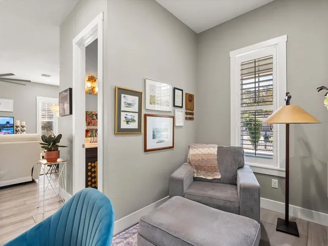 a living room with furniture and a window