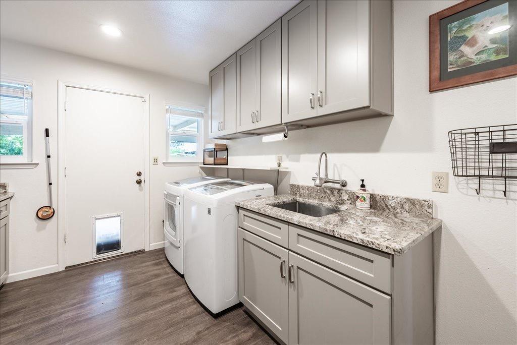 14066 Skyview Road Madera, CA 93636 - Photo 12 of 42 a kitchen with a sink stove and cabinets