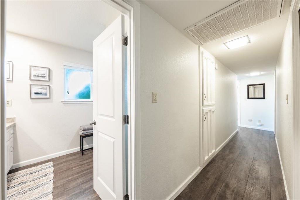 14066 Skyview Road Madera, CA 93636 - Photo 13 of 42 a view of hallway with wooden floor