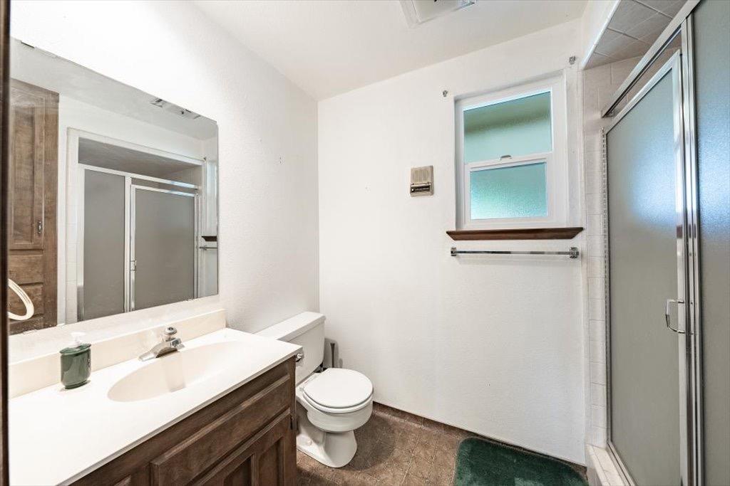 14066 Skyview Road Madera, CA 93636 - Photo 32 of 42 a bathroom with a sink and a mirror