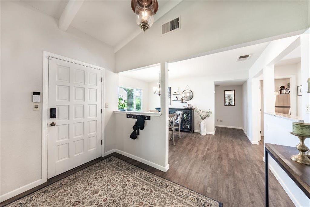 14066 Skyview Road Madera, CA 93636 - Photo 4 of 42 a view of a living room and hardwood floor