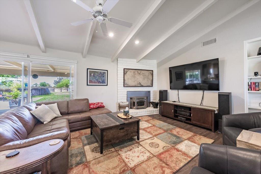 14066 Skyview Road Madera, CA 93636 - Photo 7 of 42 a living room with furniture and a flat screen tv