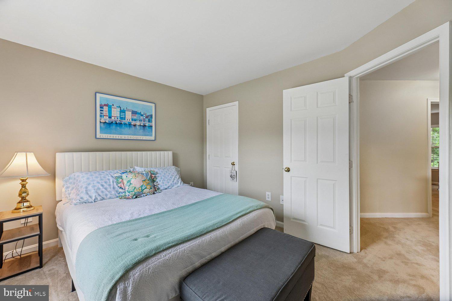 3707 Turn Back Trail Triangle, VA 22172 - Photo 35 of 55 a bedroom with a bed and a painting on the wall