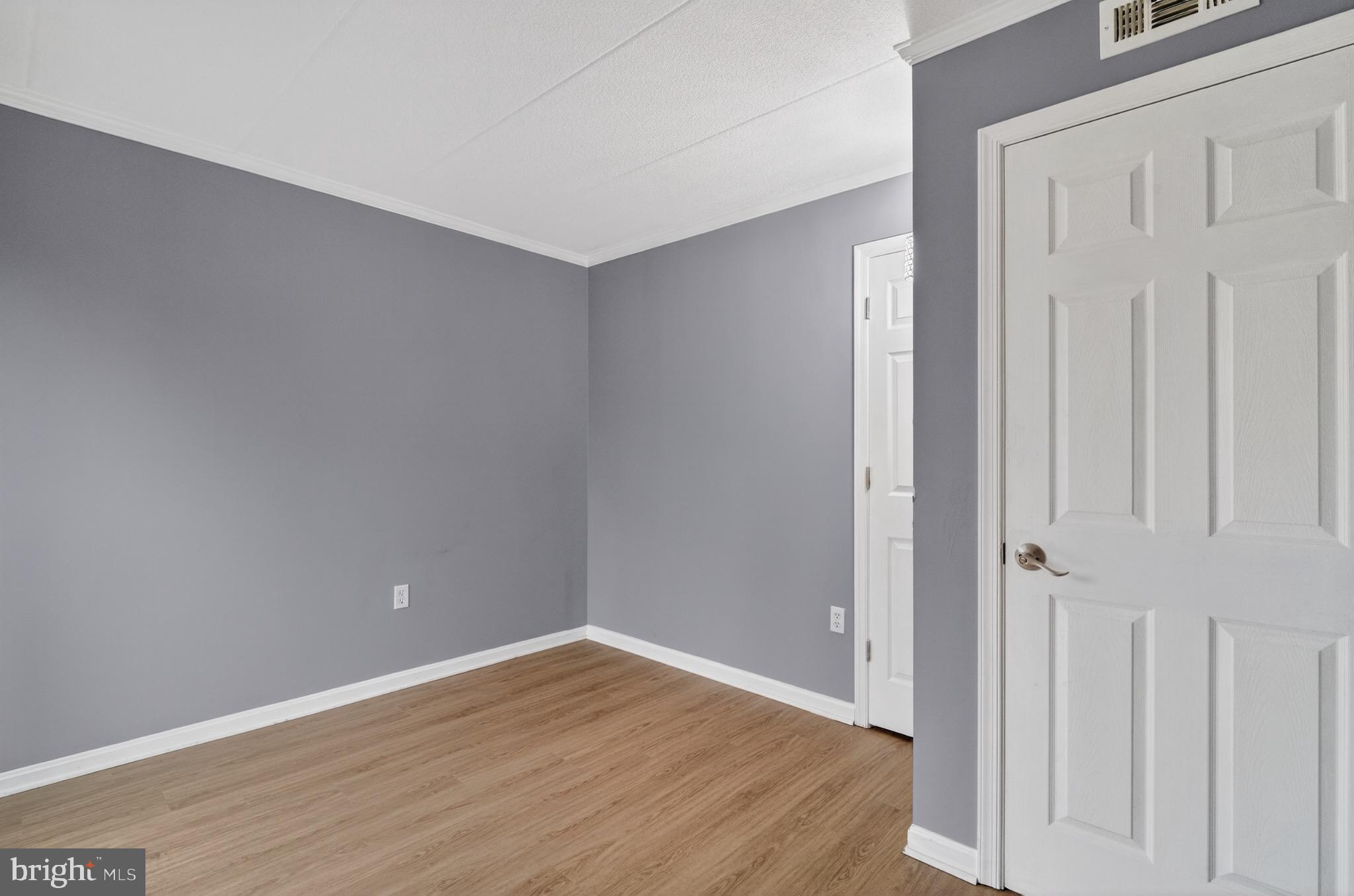 3301 Hewitt Avenue, Unit 403 Silver Spring, MD 20906 - Photo 7 of 19 Versatile space with modern gray tones.