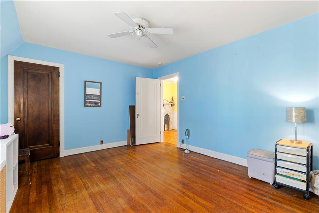 7008 Thomas Boulevard Pittsburgh, PA 15208 - Photo 13 of 23 a view of room with hardwood floor and cabinet