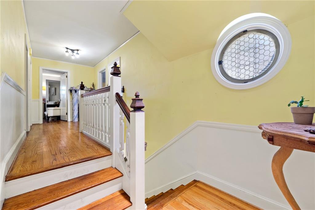 7008 Thomas Boulevard Pittsburgh, PA 15208 - Photo 17 of 23 a view of a hallway to a livingroom with furniture