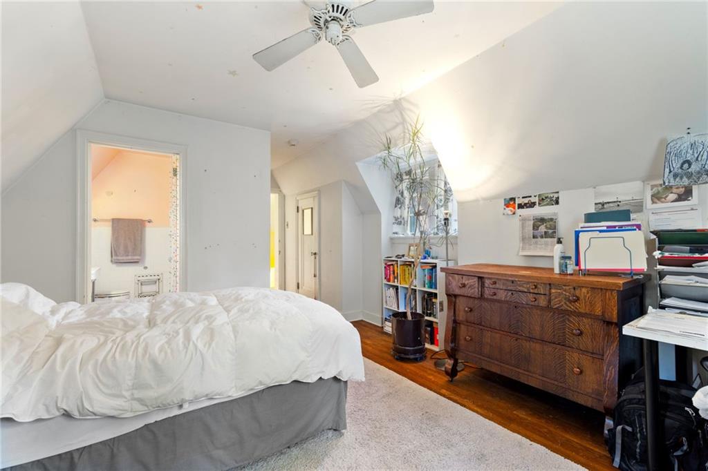 7008 Thomas Boulevard Pittsburgh, PA 15208 - Photo 18 of 23 a bedroom with a bed and furniture