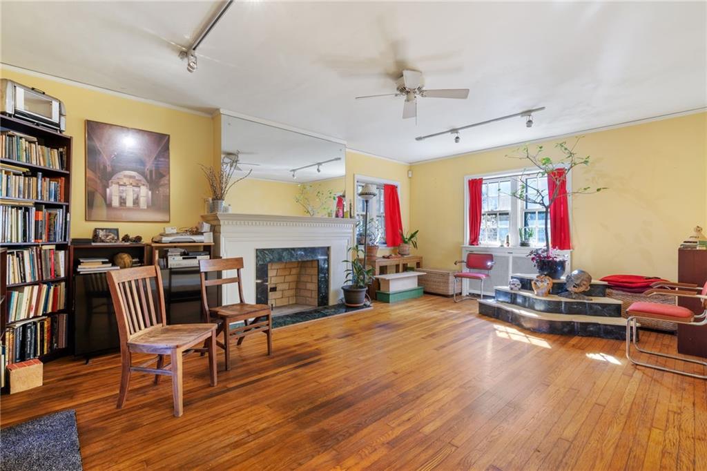 7008 Thomas Boulevard Pittsburgh, PA 15208 - Photo 3 of 23 a living room with furniture and a fireplace