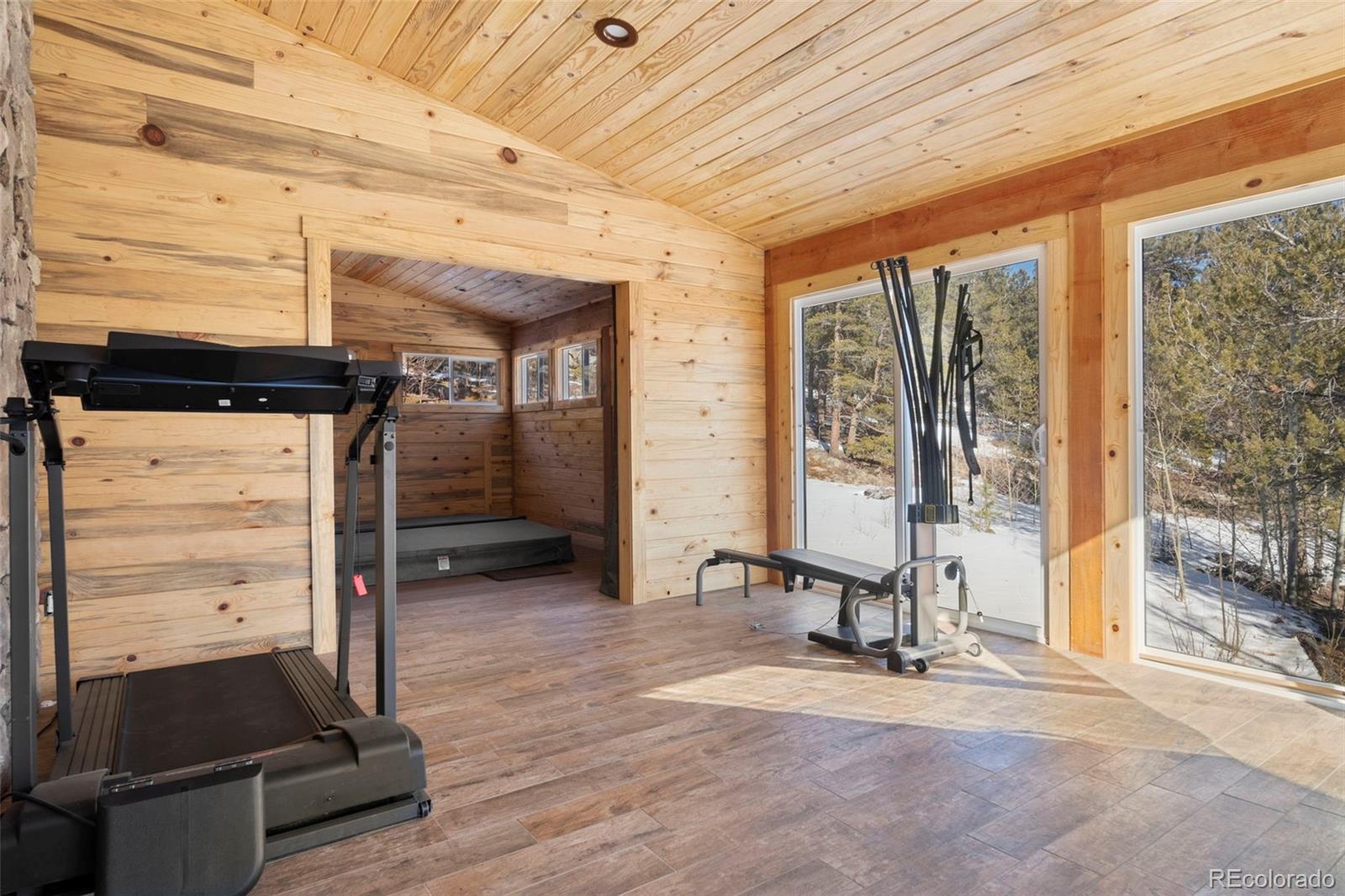 412 Evergreen Road Black Hawk, CO 80422 - Photo 26 of 48 a view of a room with gym equipment