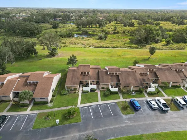 an aerial view of a house with a garden