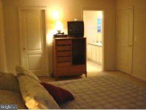 148 Barracuda Road Manahawkin, NJ 08050 - Photo 6 of 8 a bedroom with a bed