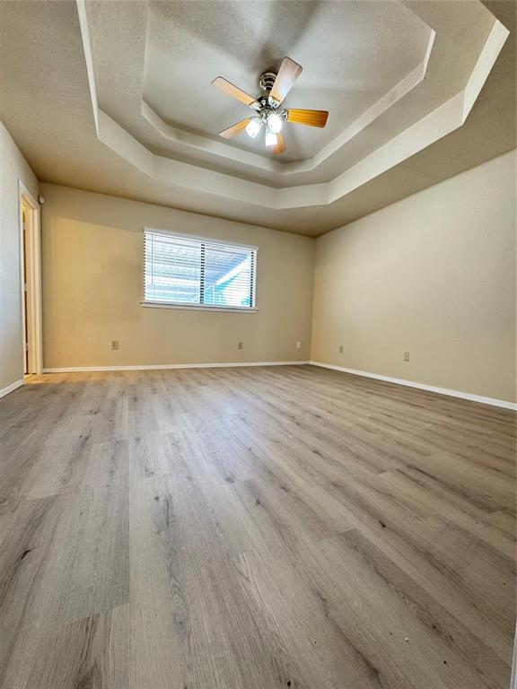 528 Post Oak Lane Allen, TX 75002 - Photo 10 of 19 wooden floor in an empty room