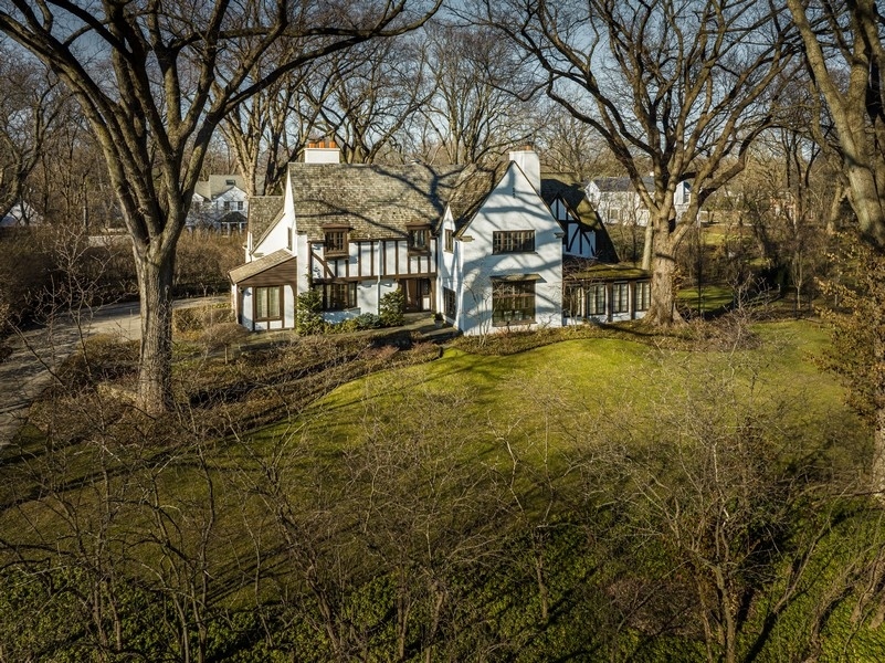 180 Dewindt Road Winnetka, IL 60093 - Photo 6 of 7 a view of residential houses with yard and covered with trees