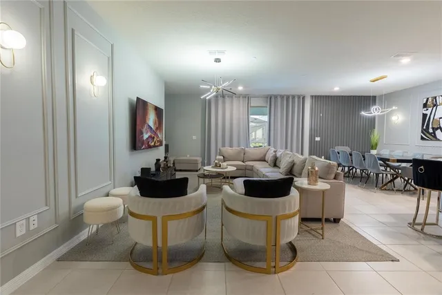 a kitchen with granite countertop a sink dishwasher stove and cabinets with wooden floor