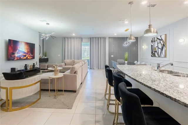 a bed room with furniture or couch and a potted plant