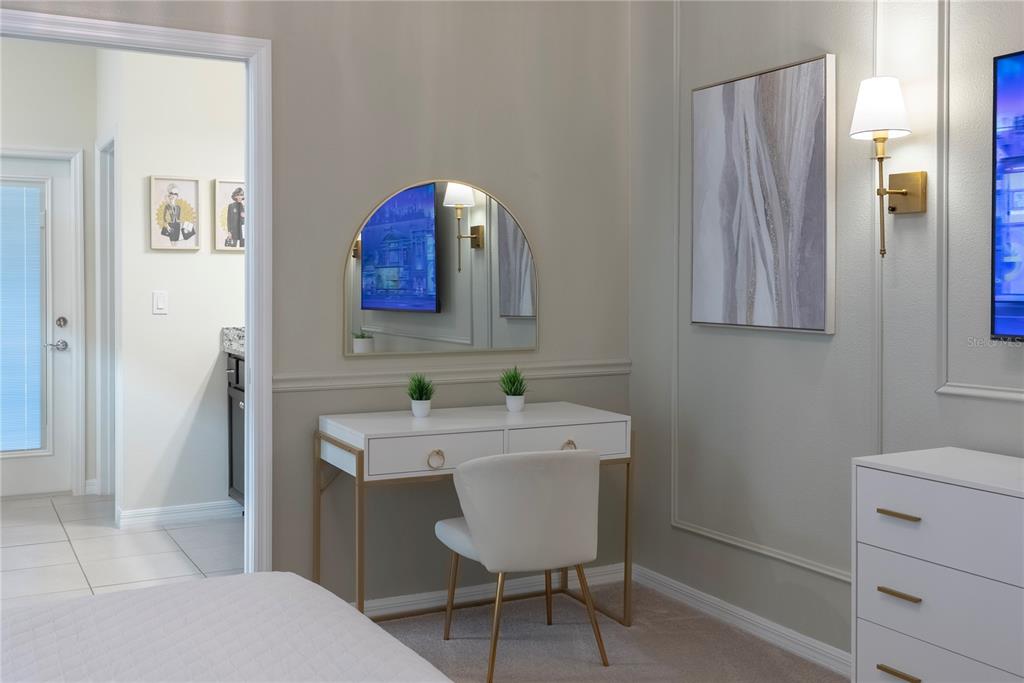 4425 Kaipo Road Davenport, FL 33897 - Photo 25 of 100 a bathroom with a sink and a mirror