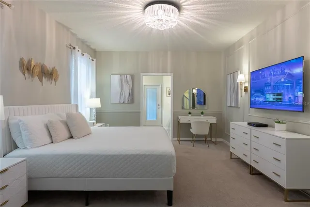 a bedroom with furniture and a bed