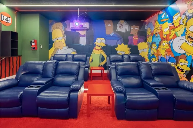 a bedroom with two beds and a chandelier