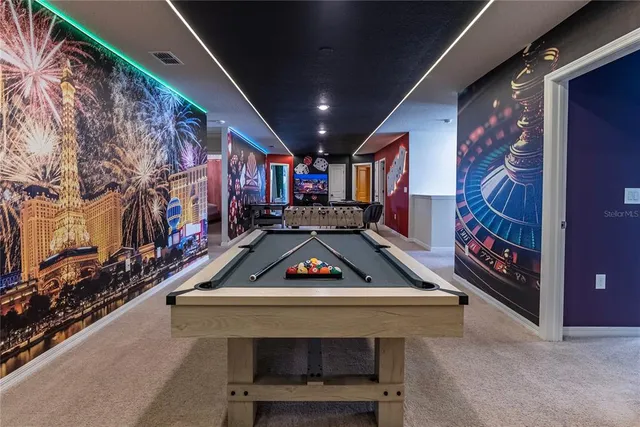 a bedroom with a bed and a potted plant