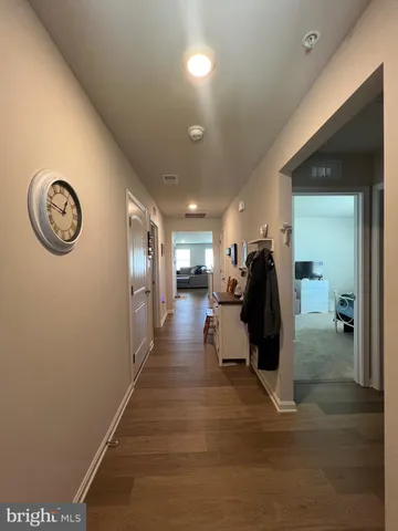 a view of a hallway with workspace