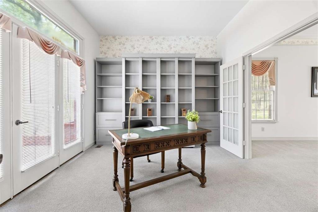 3035 Mt Zion Road Oxford, GA 30054 - Photo 29 of 99 a view of a workspace with furniture and a window