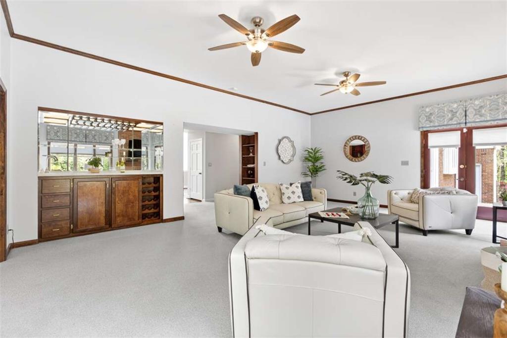 3035 Mt Zion Road Oxford, GA 30054 - Photo 35 of 99 a living room with furniture and a large window