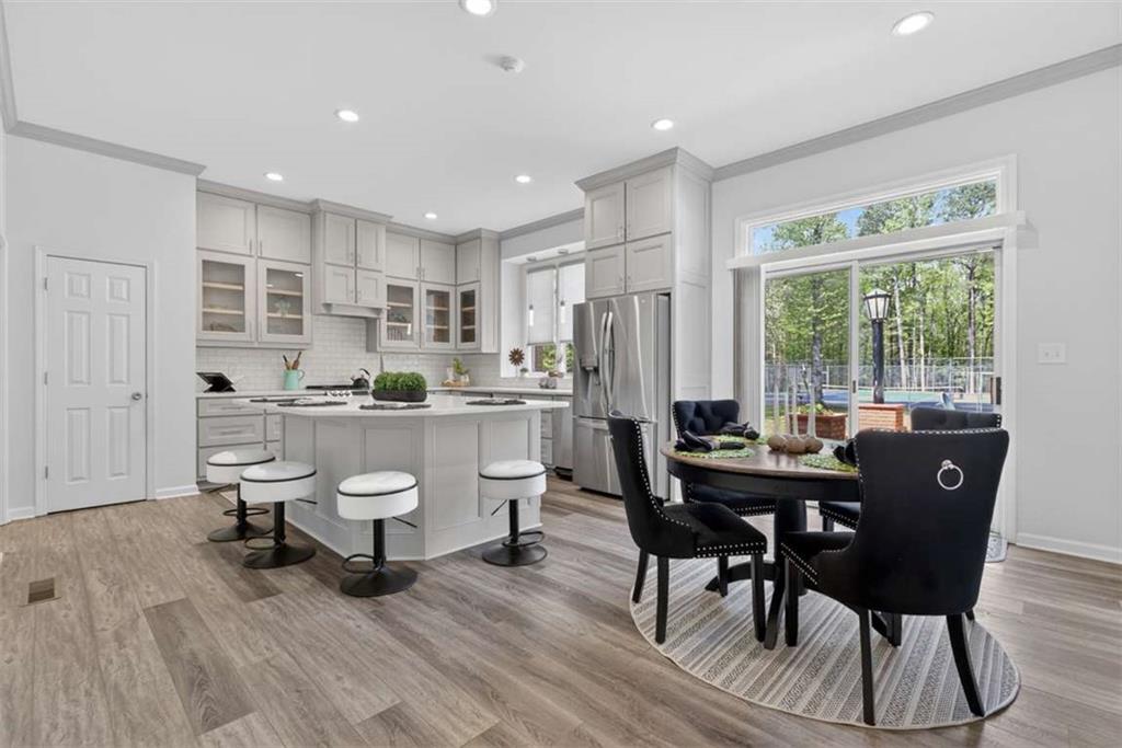 3035 Mt Zion Road Oxford, GA 30054 - Photo 4 of 99 a view of a dining room with furniture window and outside view