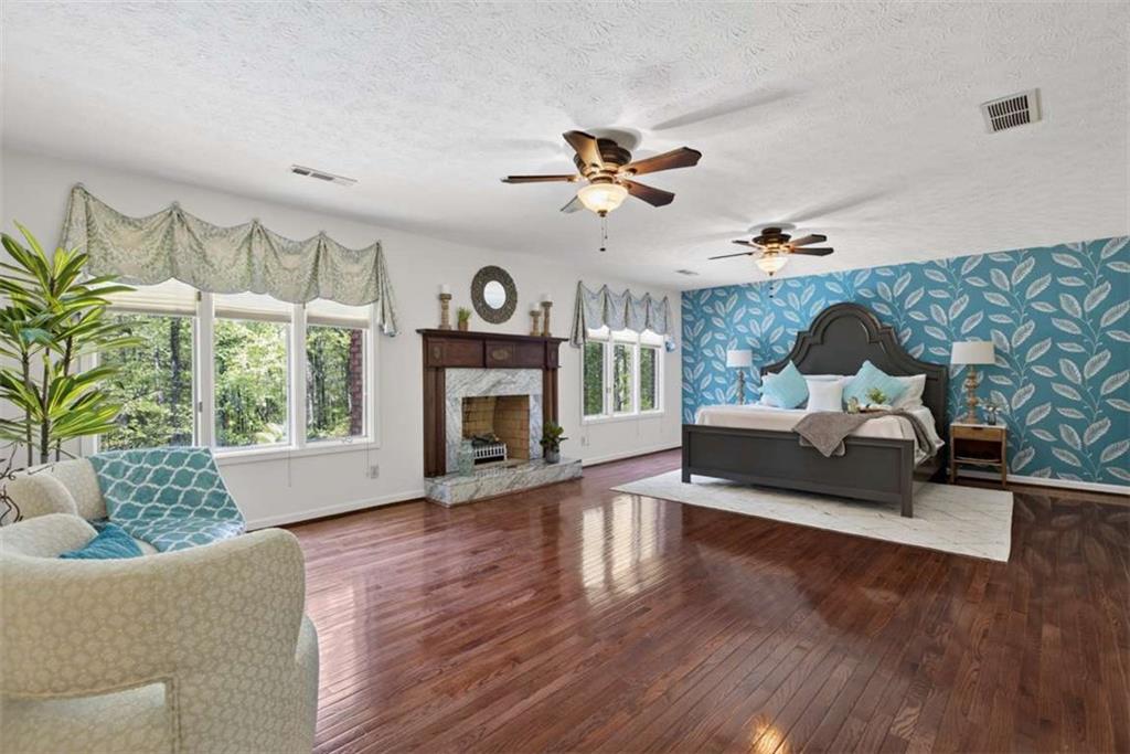 3035 Mt Zion Road Oxford, GA 30054 - Photo 50 of 99 a living room with furniture fireplace and a large window
