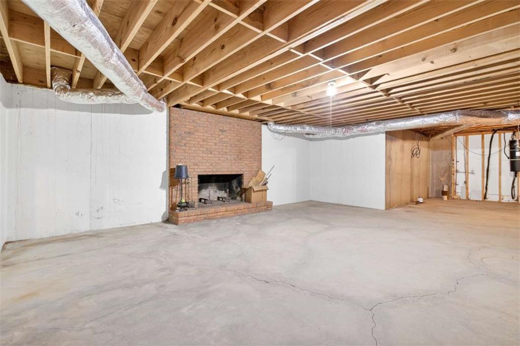 3035 Mt Zion Road Oxford, GA 30054 - Photo 73 of 99 a view of an empty room with a fireplace