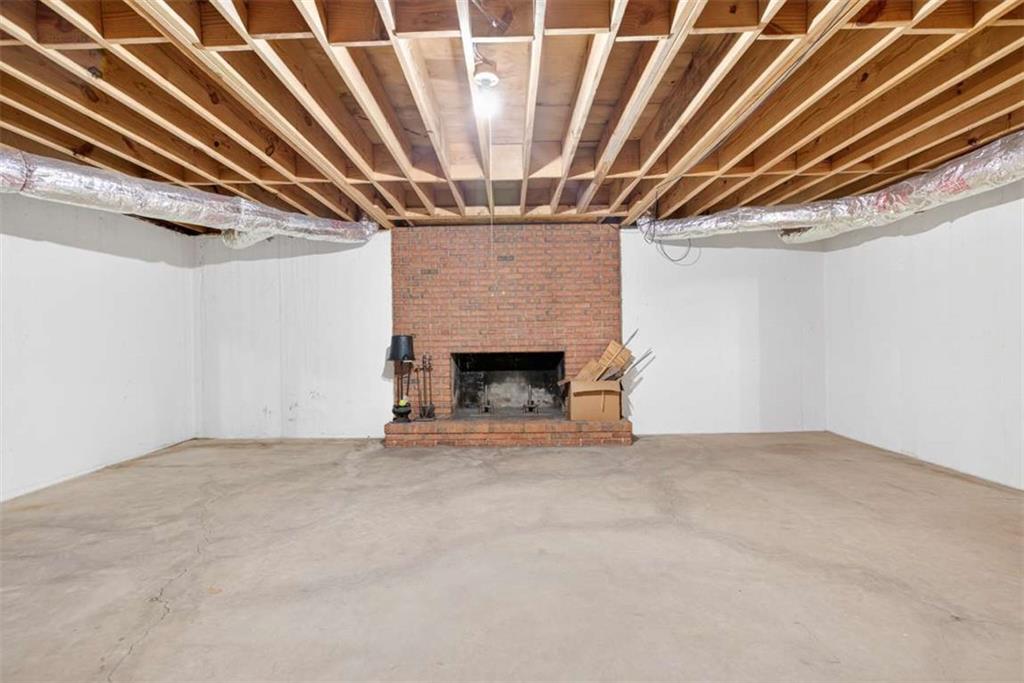 3035 Mt Zion Road Oxford, GA 30054 - Photo 74 of 99 a view of an empty room with a fireplace