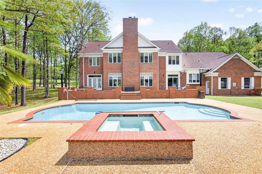 3035 Mt Zion Road Oxford, GA 30054 - Photo 81 of 99 a front view of residential houses with yard