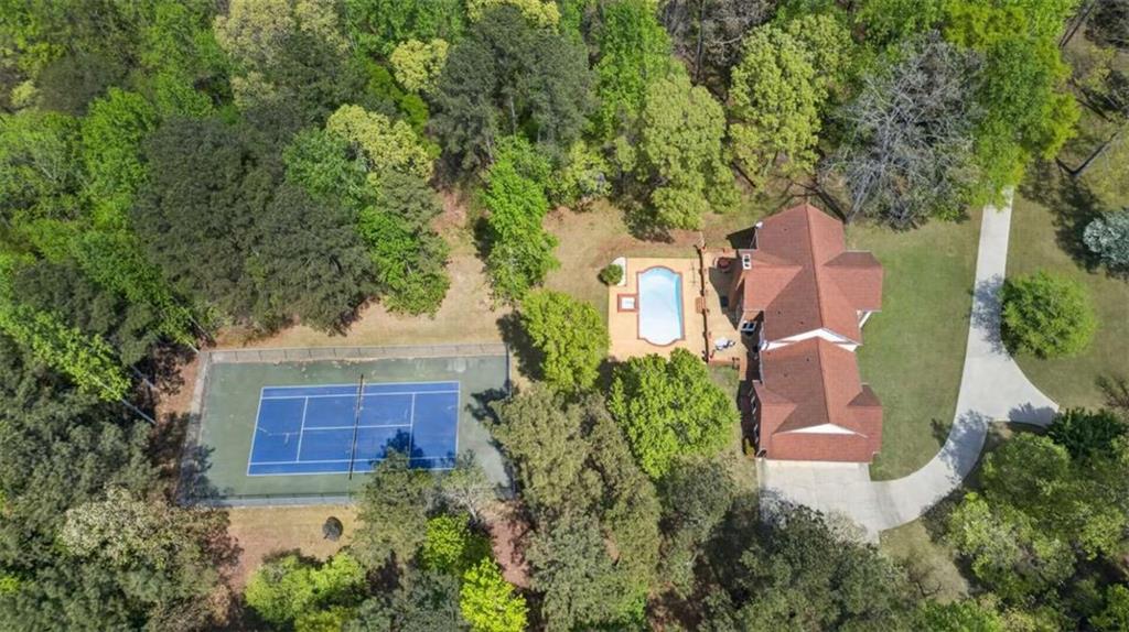 3035 Mt Zion Road Oxford, GA 30054 - Photo 97 of 99 an aerial view of residential house with outdoor space and trees all around