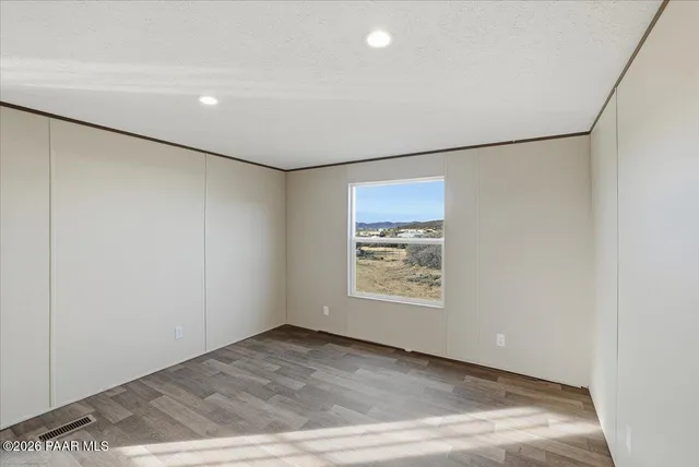 an empty room with windows